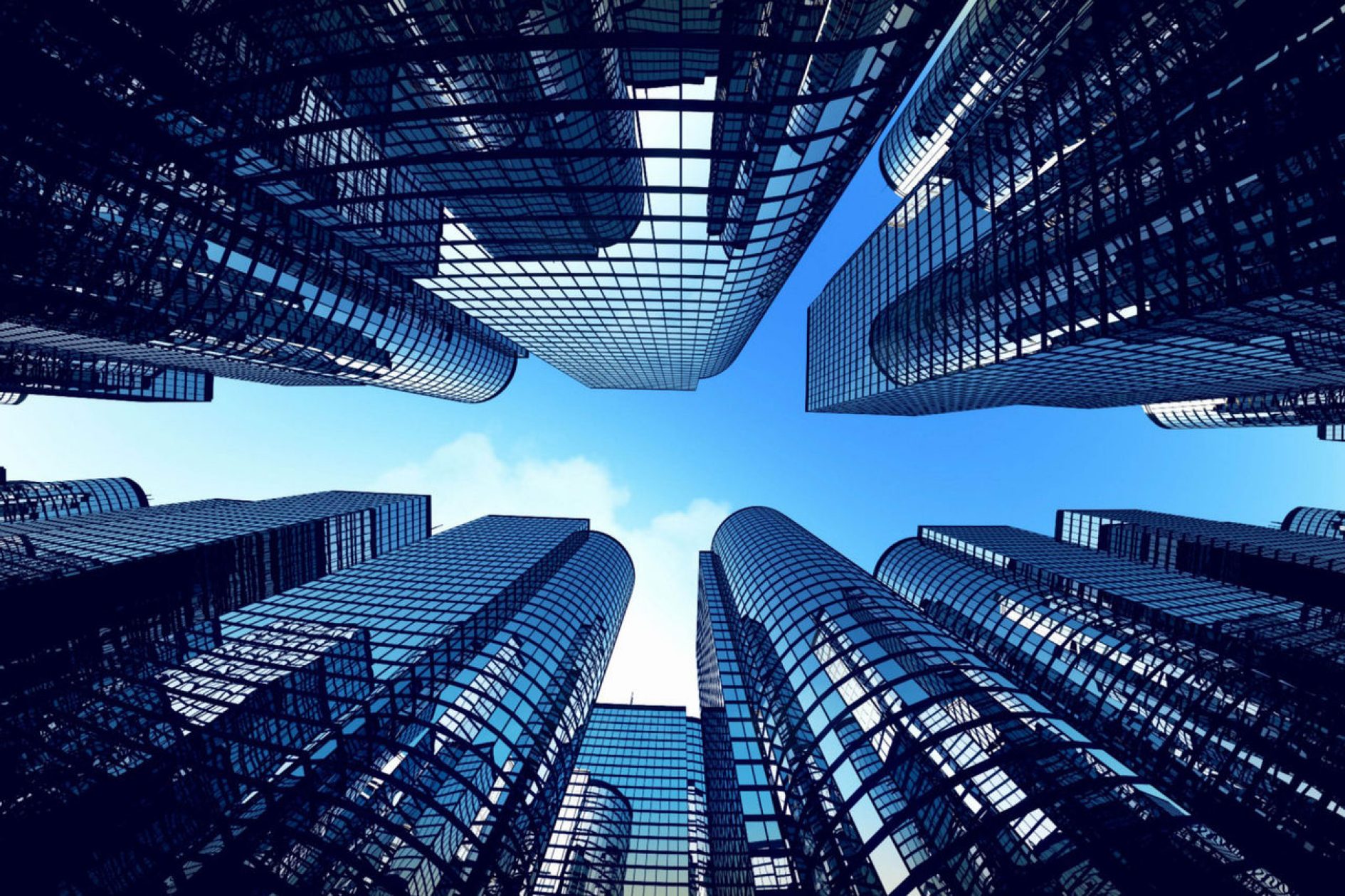 Low-angle view of tall glass skyscrapers reaching toward blue sky, creating geometric patterns in urban canyon.